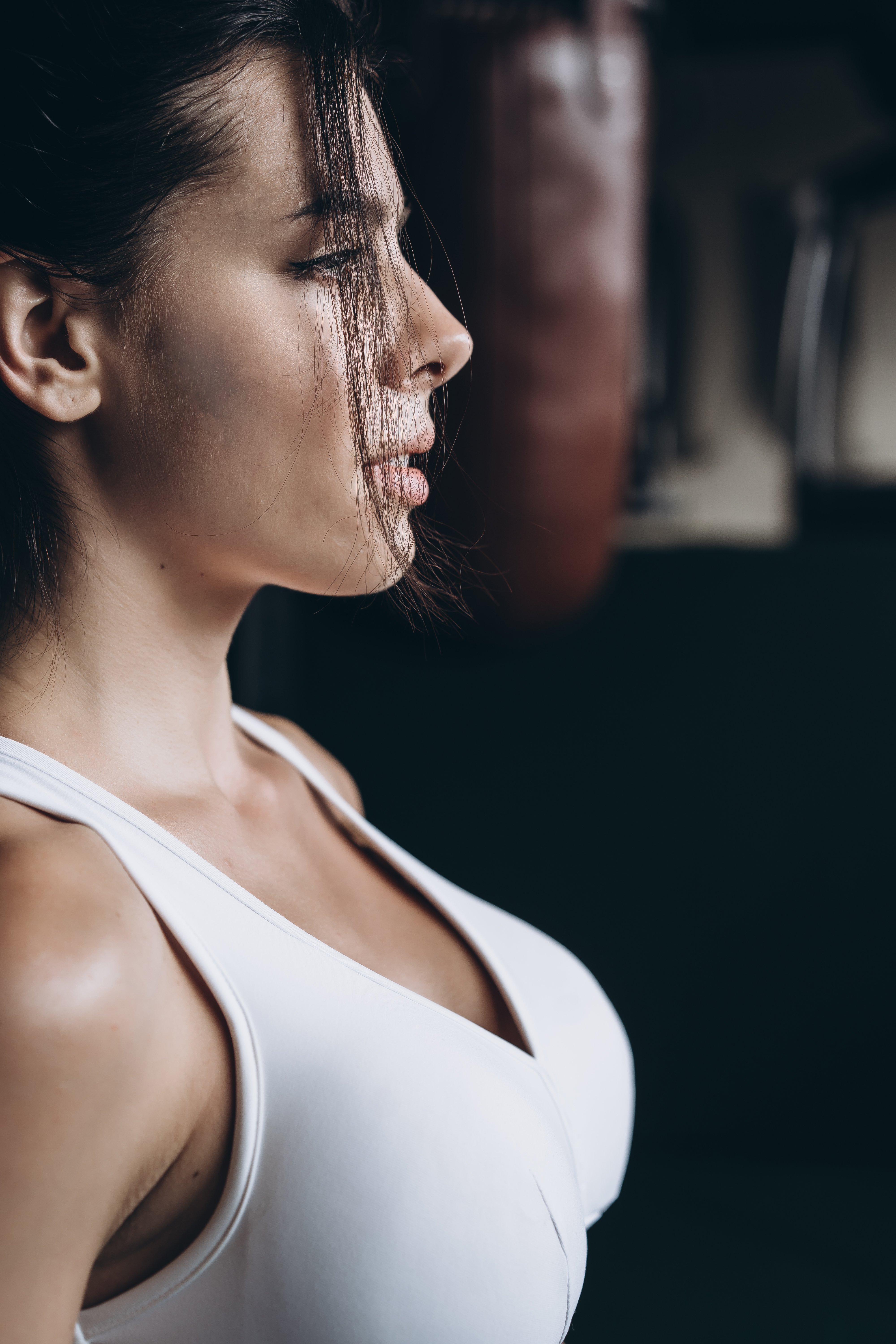 boxing-woman-posing-with-punching-bag-strong-independent-woman-concept boxing-woman-posing-with-punching-bag-strong-independent-woman-concept